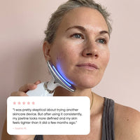 5-star review – Sophie M. using device with blue light on jawline